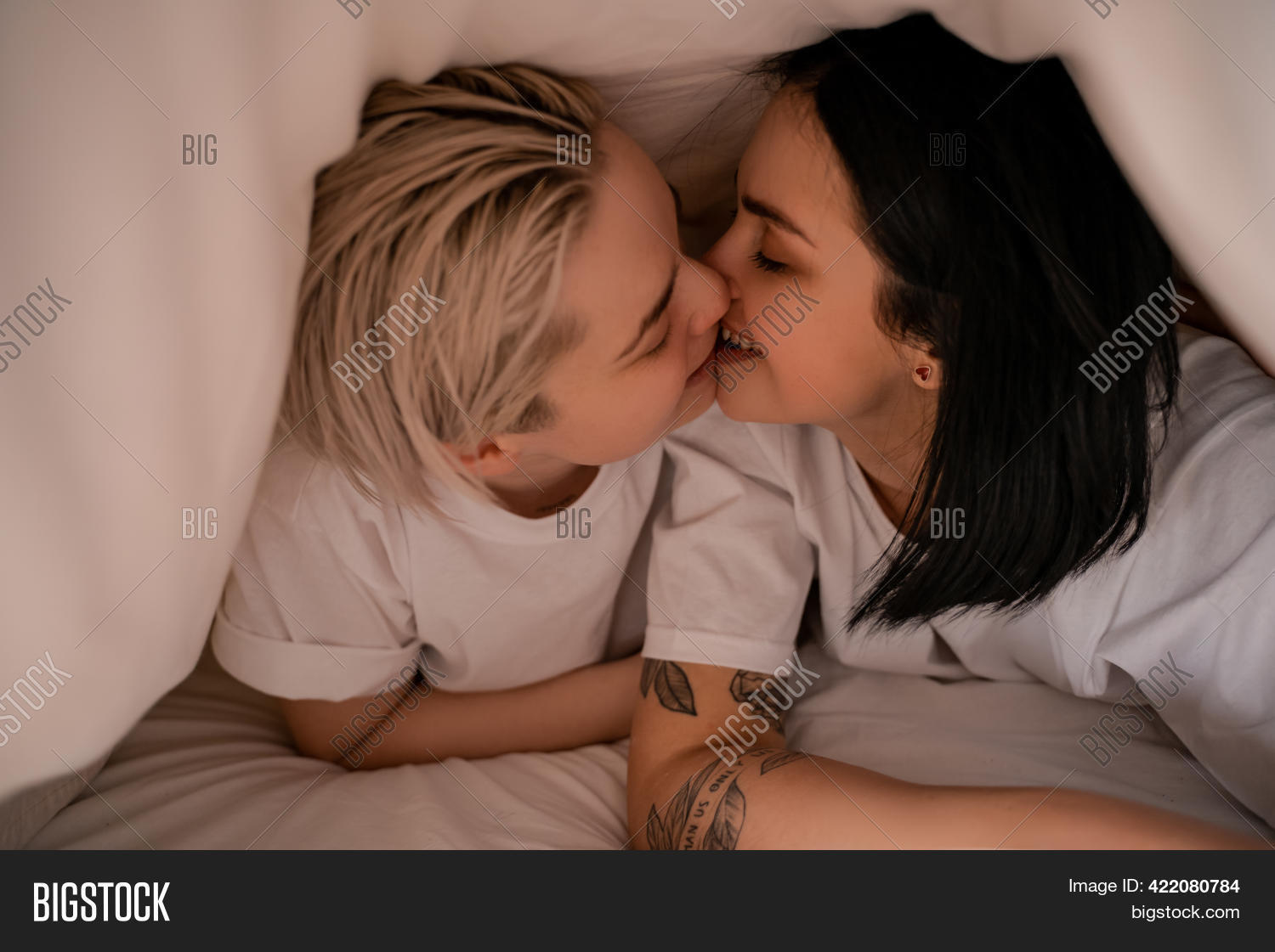 dixie watt add lesbians kissing on bed photo