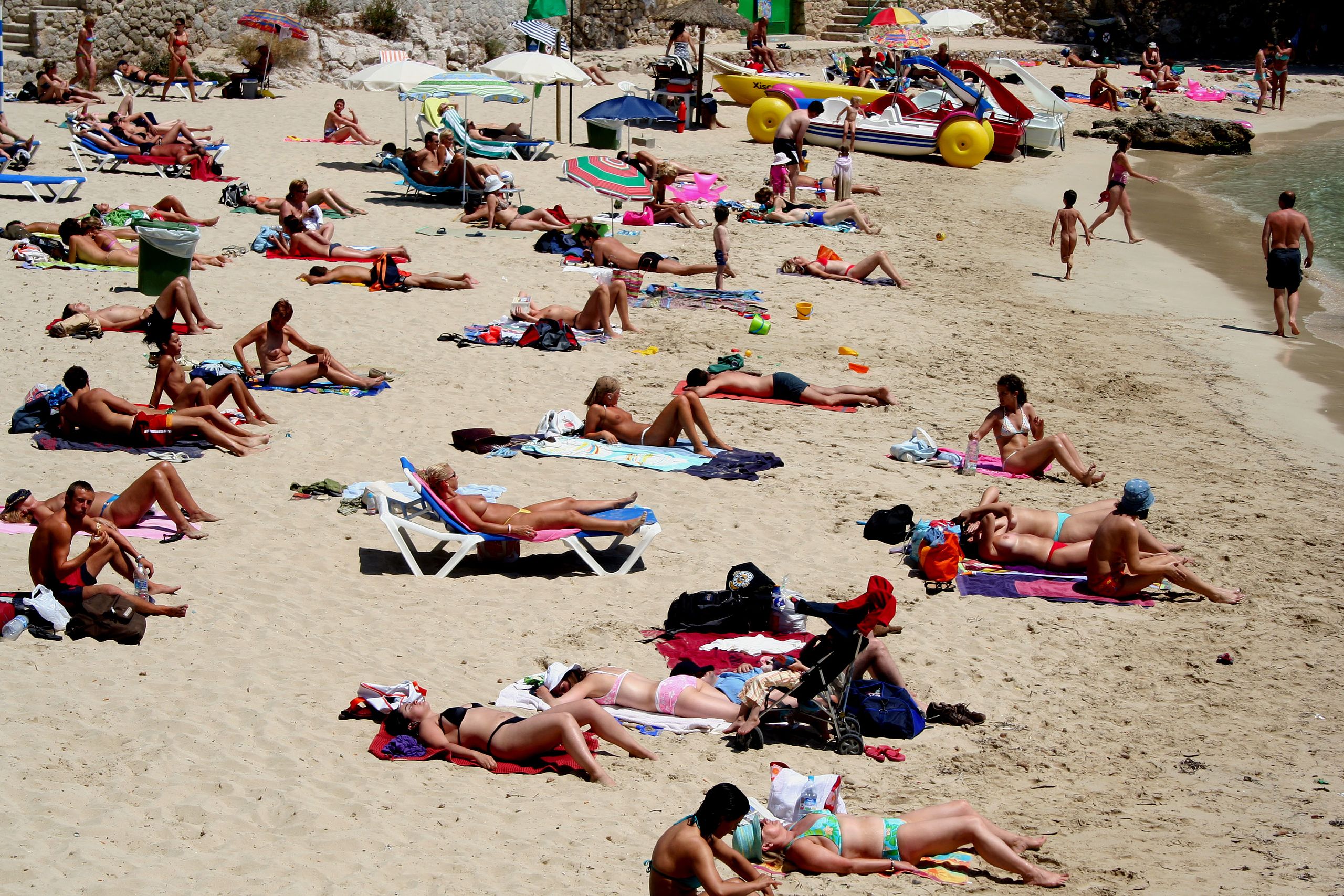 david mcbee recommends topless beach pictures pic