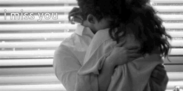 romantic miss you couple hug gif