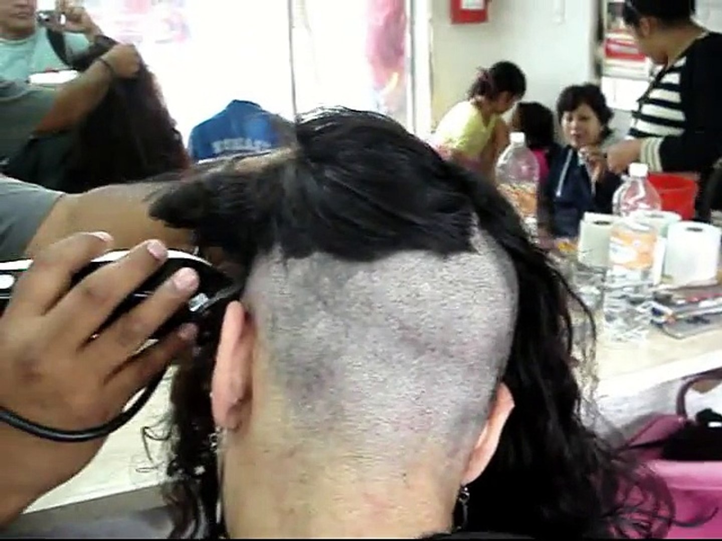 charyl clark add photo woman headshave in barbershop