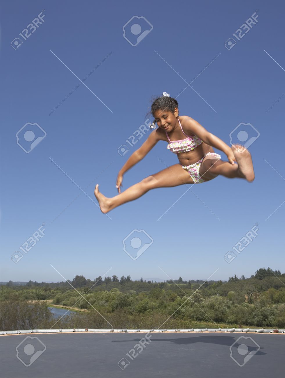 girls jumping on trampolines