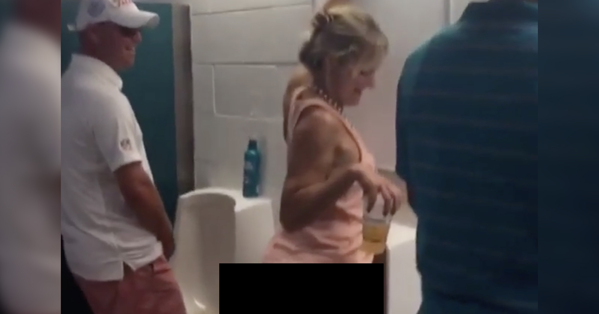 davis wayas banoog add photo woman helping man pee