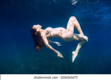 apurba raihan recommends naked women swimming underwater pic