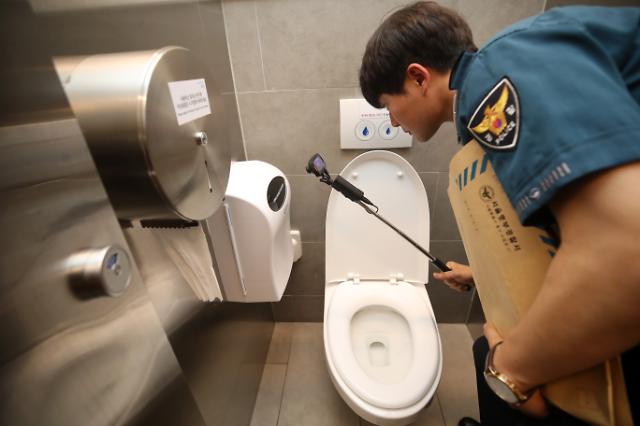 mens restroom spy cam