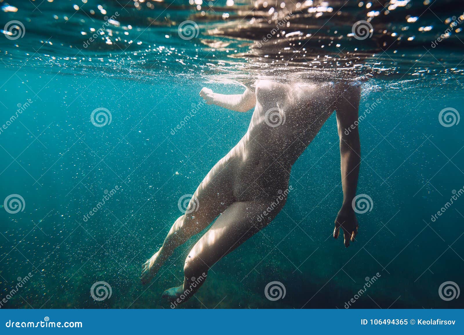 dena reynolds add nude women swimming underwater photo