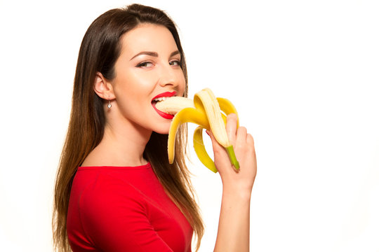 woman eating banana picture