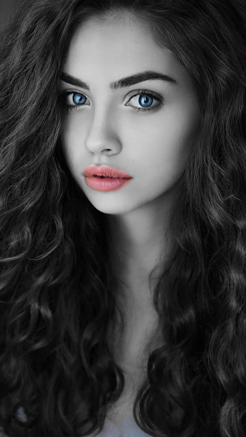 black curly hair blue eyes