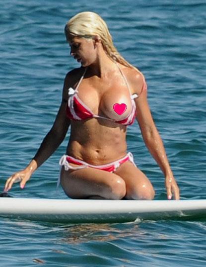 carlos esteva add photo bikini falls off at beach