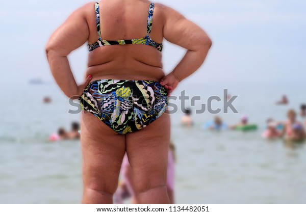 fat girl on beach