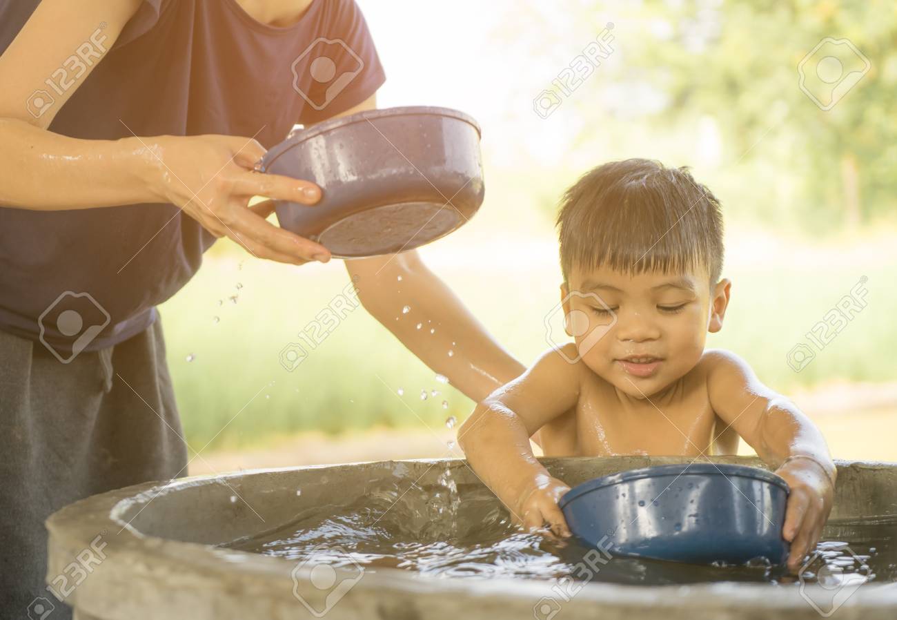 asam ilyas recommends mother and son bathing pic