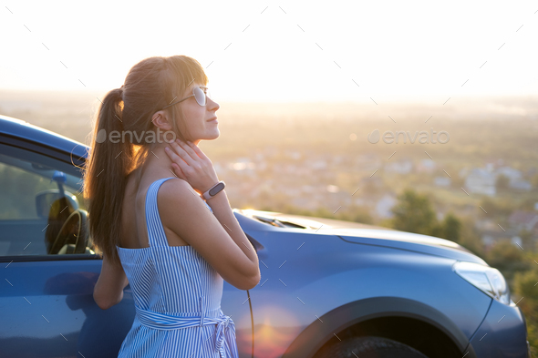 Best of Girl in blue dress in car