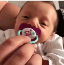 baby giving the finger gif