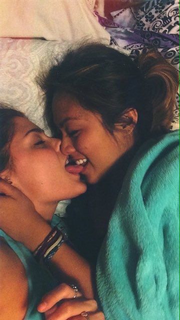 two girls tounge kissing