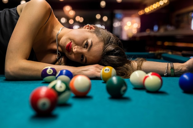 sexy woman playing pool