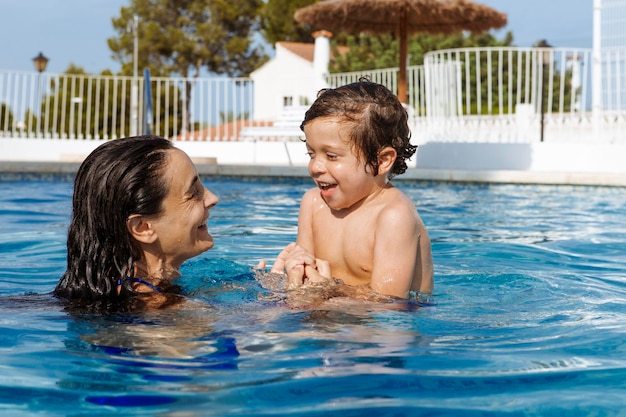 Best of Mother and son bathing