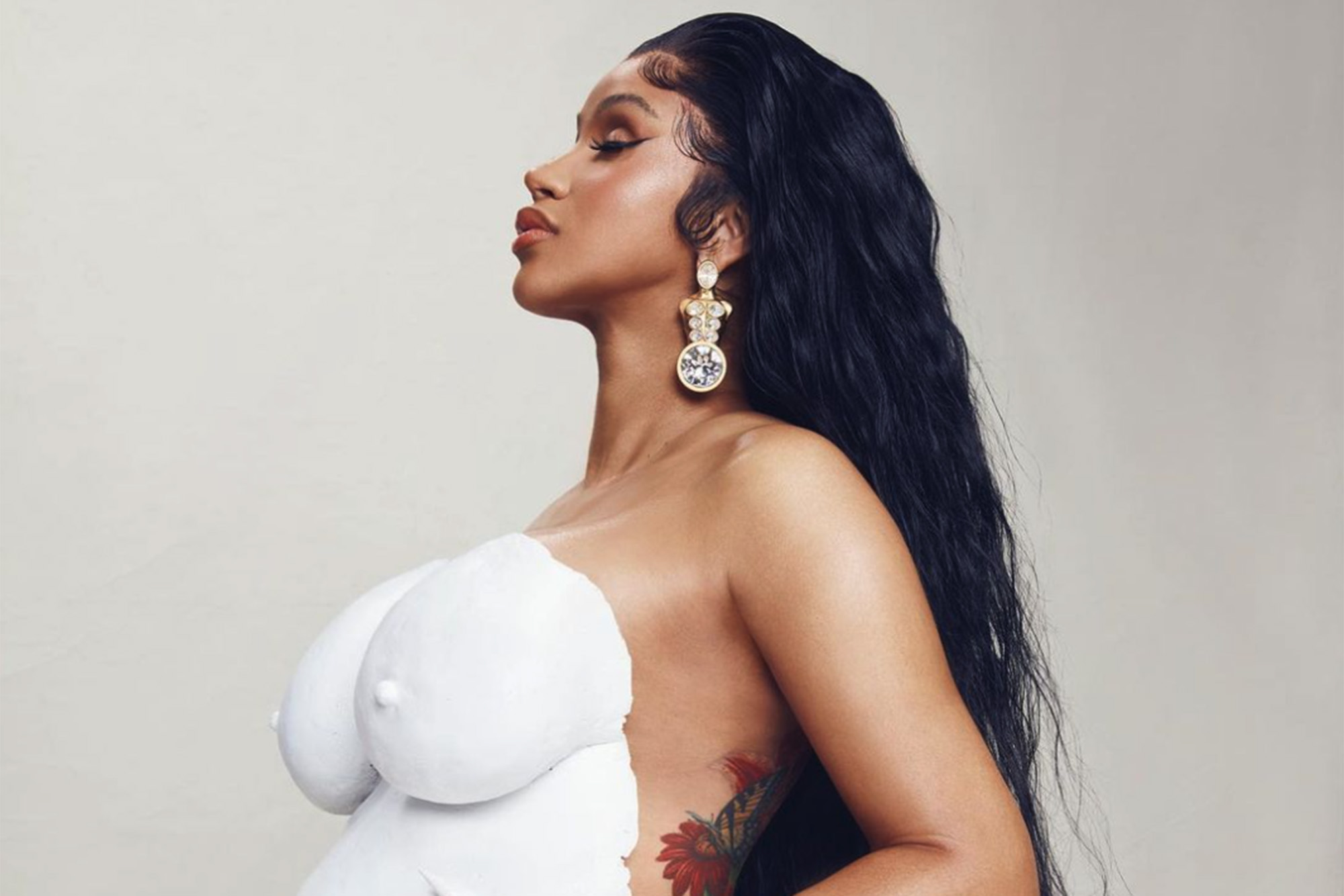 david reents add photo cardi b tities