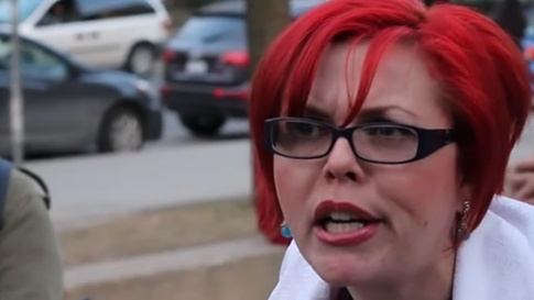 christian grimmett add angry red haired feminist photo